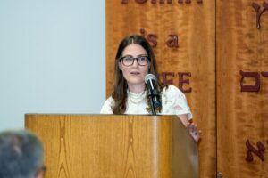 Annual Meeting 2025, Sarah Warren at Podium